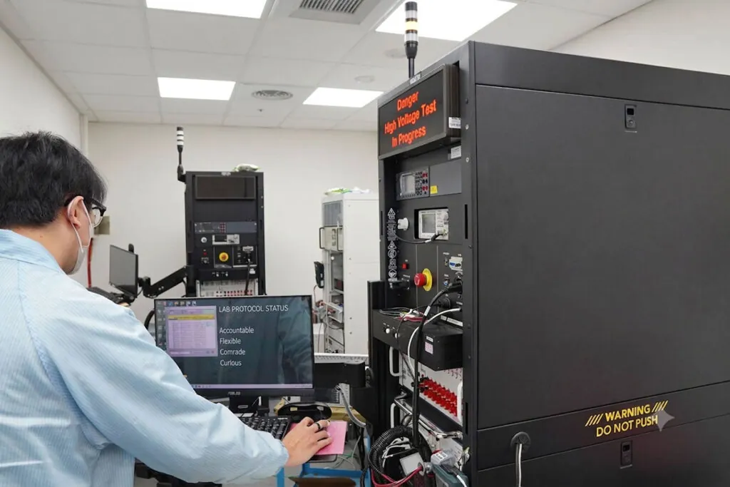 EEC Huayi hipot tester being verified against traceable reference standards during annual calibration
